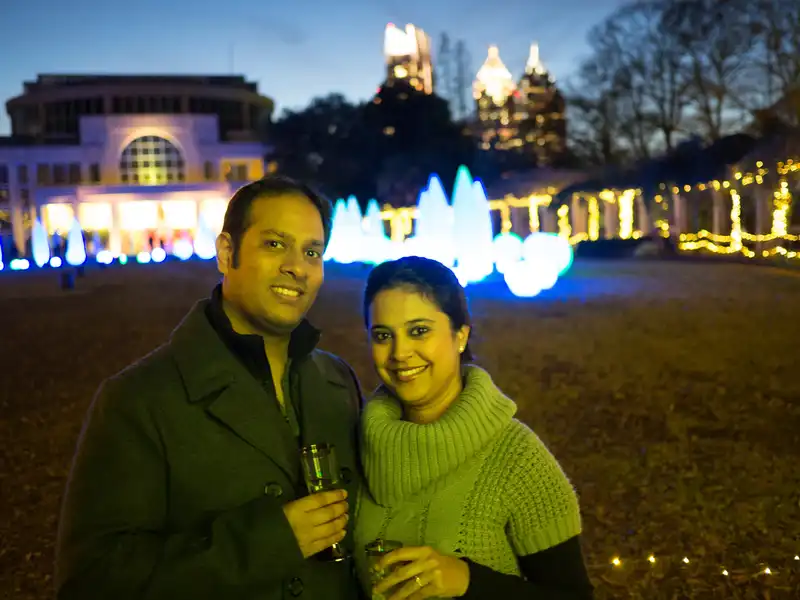 Gauti and Aparna with the musical lightshow and the Atlanta Skyline