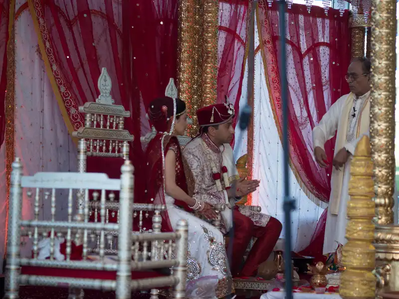 Shuchi and Utpal in the middle of getting married